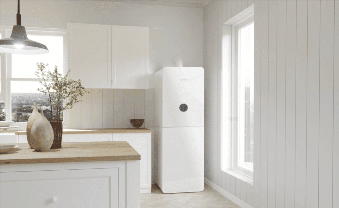 Pompe à chaleur compacte CSY iCondens blanche dans cuisine lumineuse.